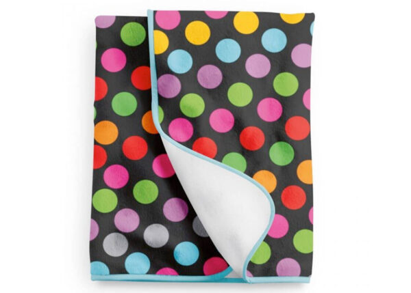 Custom-printed polar fleece blanket with sublimation printing. Blanket with colorful polka dots. One side fully personalized. AMGS Group.