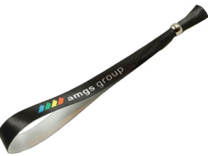 Elegant black satin wristband with AMGS Group logo and metal bead closure for VIP guests. AMGS Group.