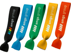 Set of promotional twistband hair ties in different colors with AMGS Group logo.