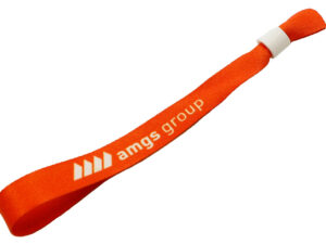 Custom fabric wristbands. Bright orange polyester wristband with AMGS Group logo and plastic slide lock for branded access control.
