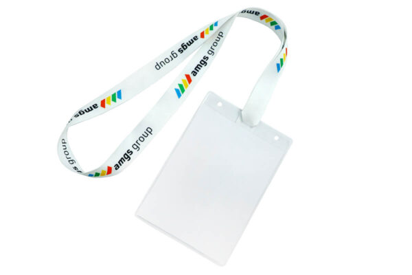 A pre-assembly view showing a white polyester lanyard with attachment slits next to a clear plastic ID holder.