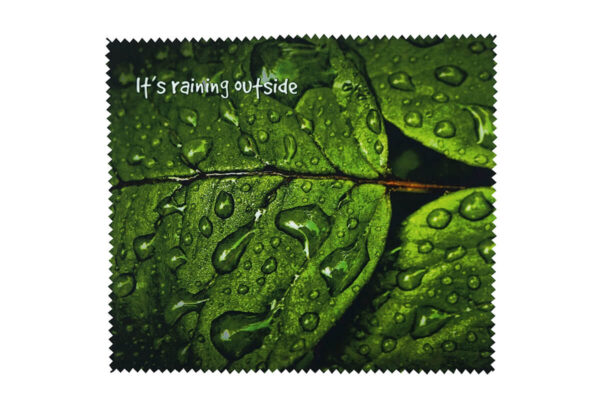 Microfiber cloth with photographic print showing a green leaf with raindrops – unique promotional item by AMGS Group.