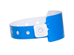 Custom Vinyl Wristband 25 mm. Blue 25mm vinyl wristband with a secure white plastic snap. Side view showing the tamper-proof closure mechanism. Manufacturer AMGS Group.