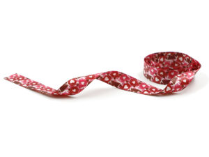 Red and pink promotional ribbon with dense heart pattern. Saturated double-sided print, perfect for corporate Valentine's gifts. Manufacturer AMGS Group.