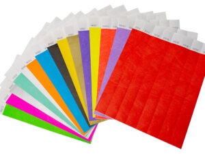 Fan of 25mm wide Tyvek wristbands in assorted colors. Identification bands with extra print space. Manufacturer AMGS Group.